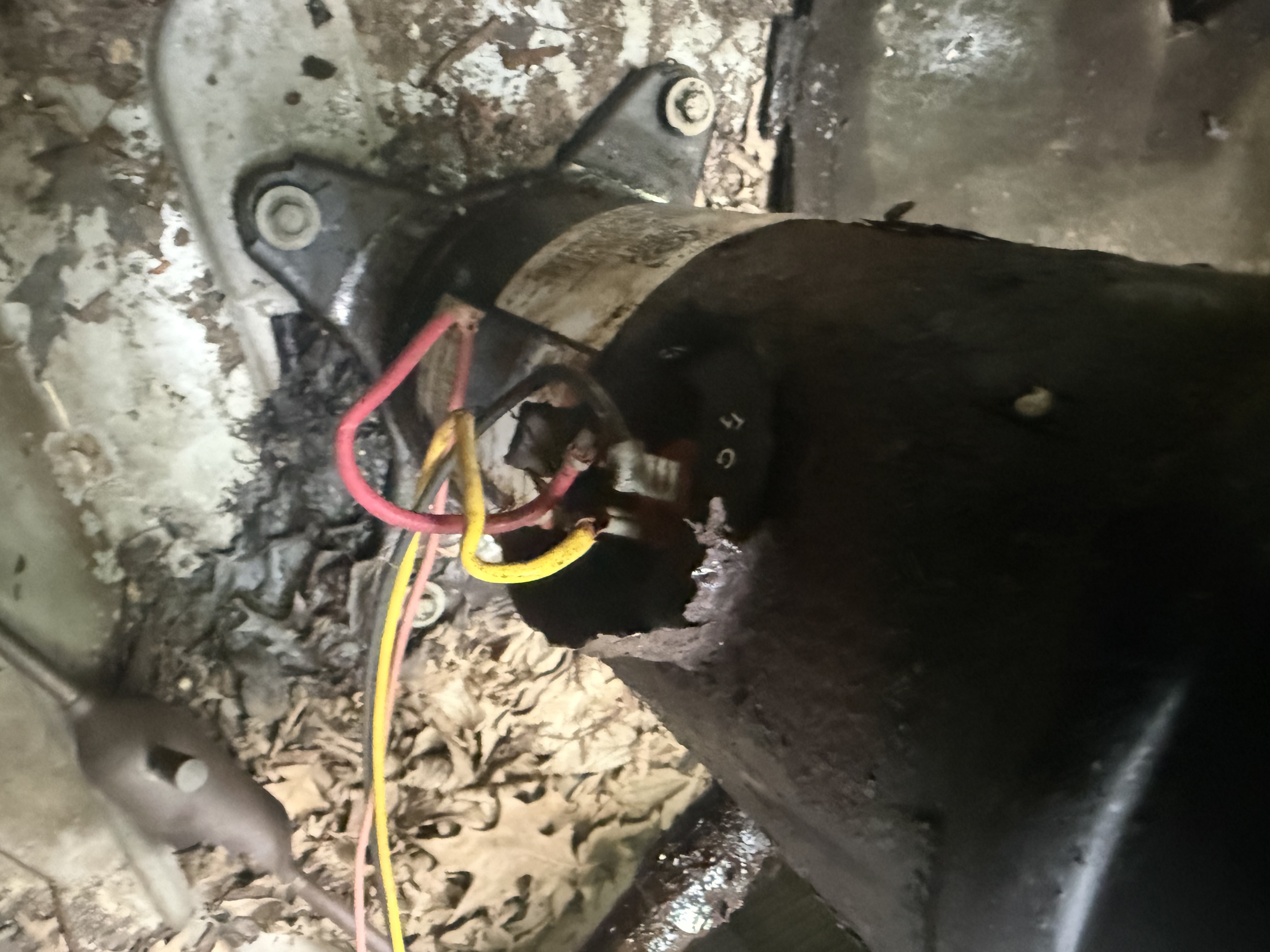 Close-up of HVAC component wiring during a repair